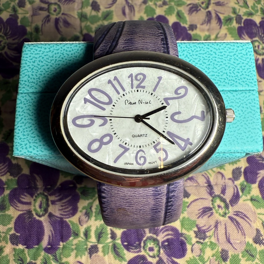Vintage Watch by Piere Nicol 
Purple leather spring bangle band